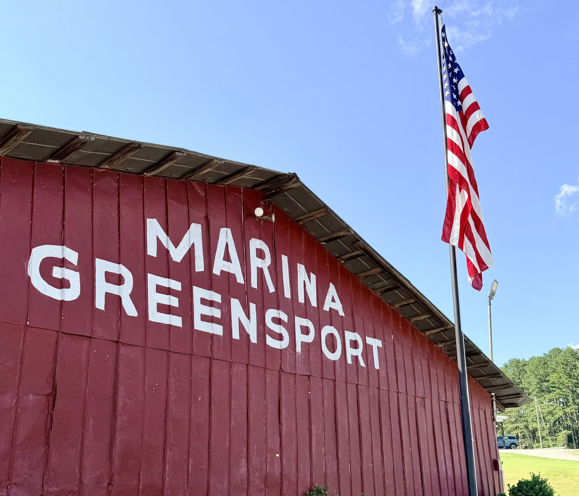 Greensport Marina barn with the American flag