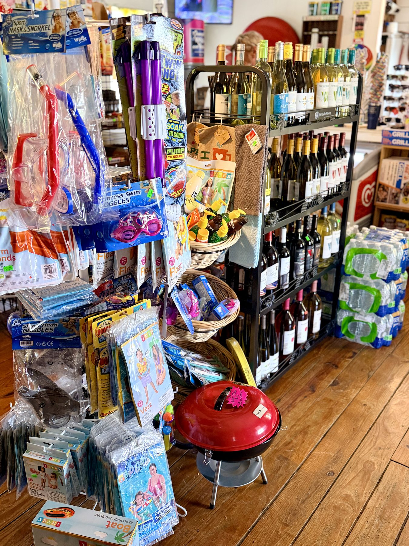 Greensport general store stocked with lake gear, wine, and supplies