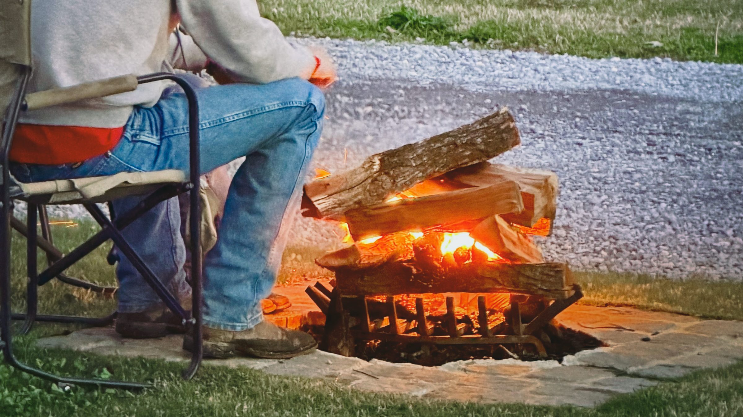 Evening campfire at a Greensport RV Park site